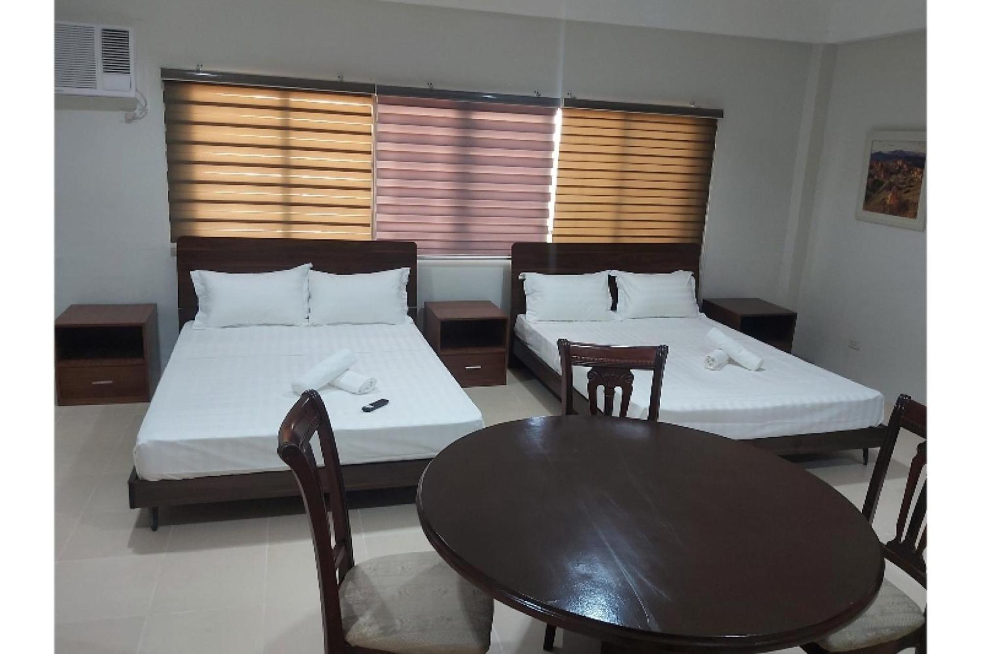 Nest Suites كويزون سيتي المظهر الخارجي الصورة